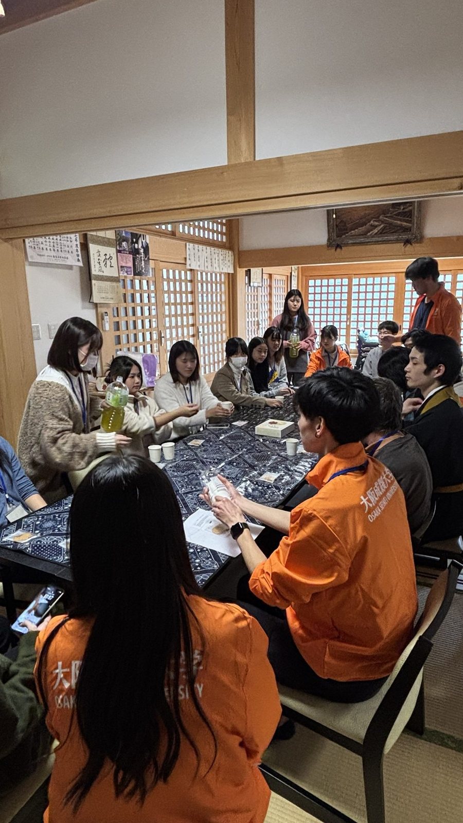 Students sharing tea at the temple