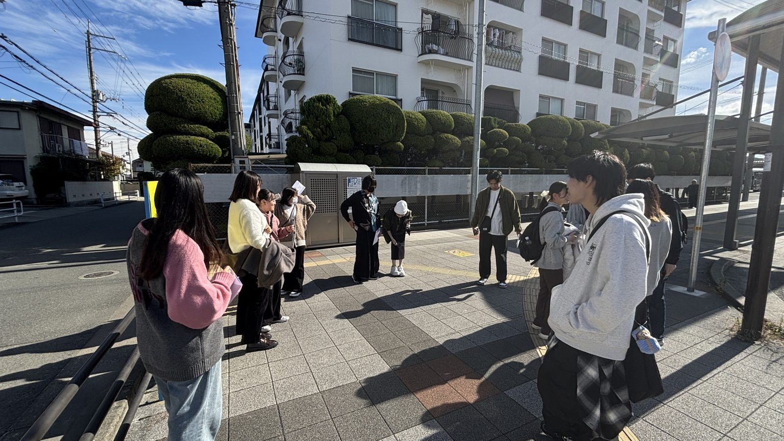 Students on a guided town walk in Sanda