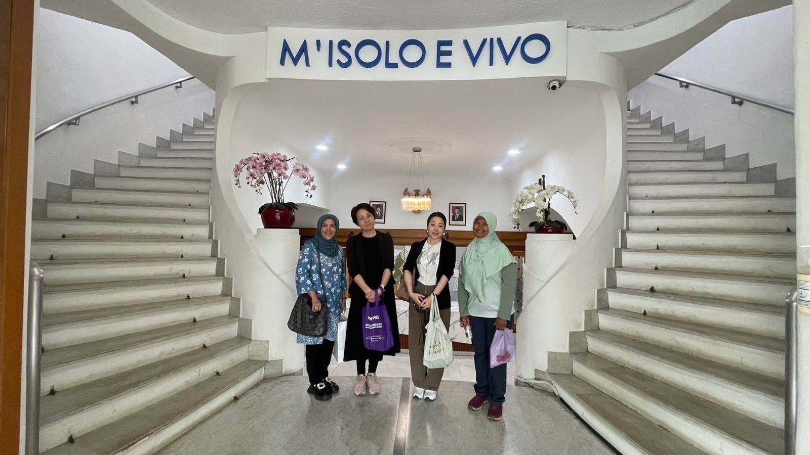 Emi Davis with UPI faculty at Villa Isola